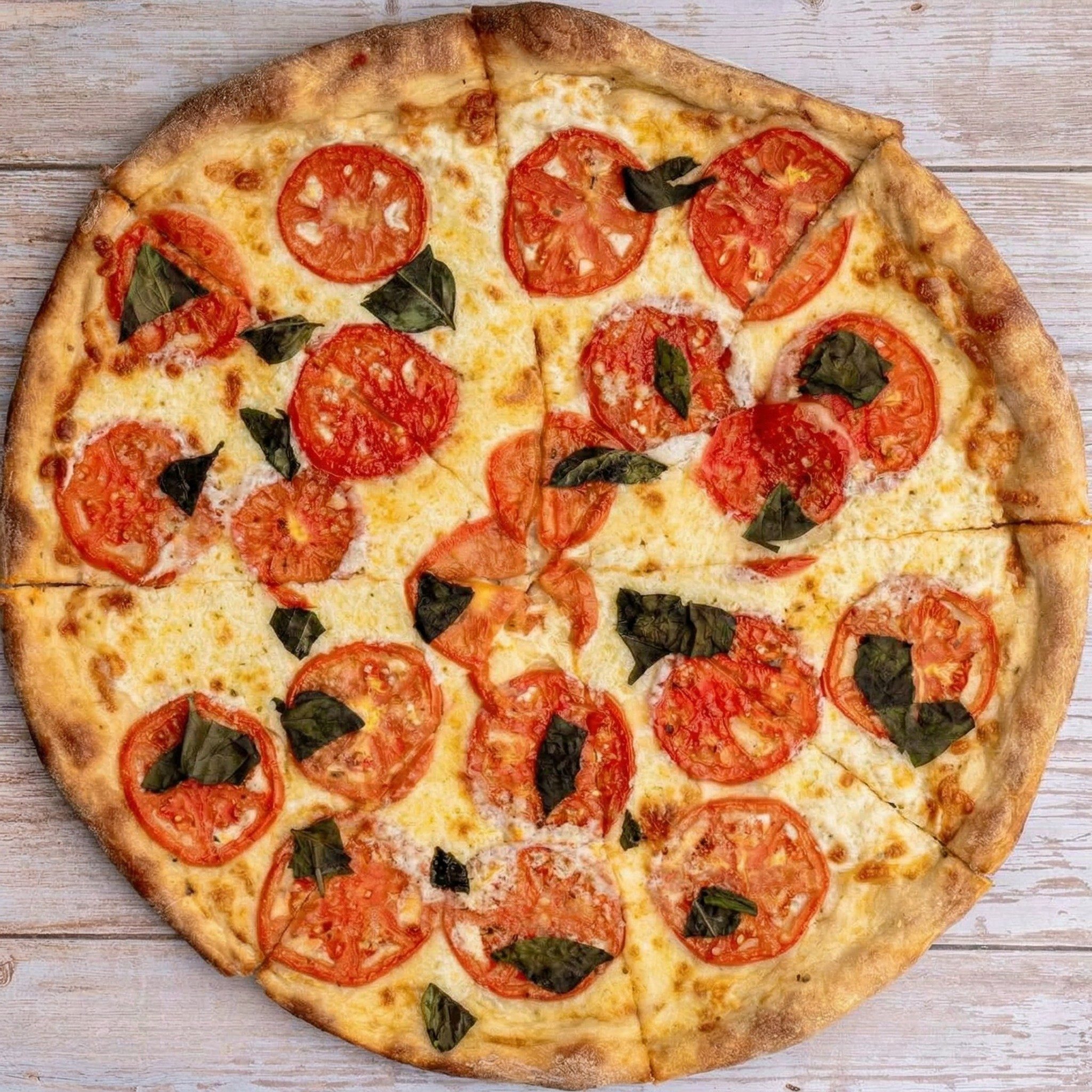 White Caprese Specialty Pizza.