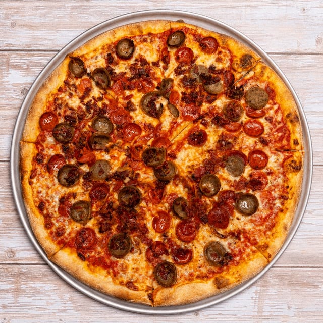 Mighty Meats Specialty Pizza.