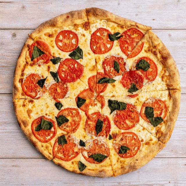 White Caprese Specialty Pizza.