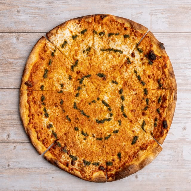 THCR Round Vodka Specialty Pizza.